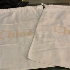 Chloe’ set of 2 draw-sting canvass dust bags.